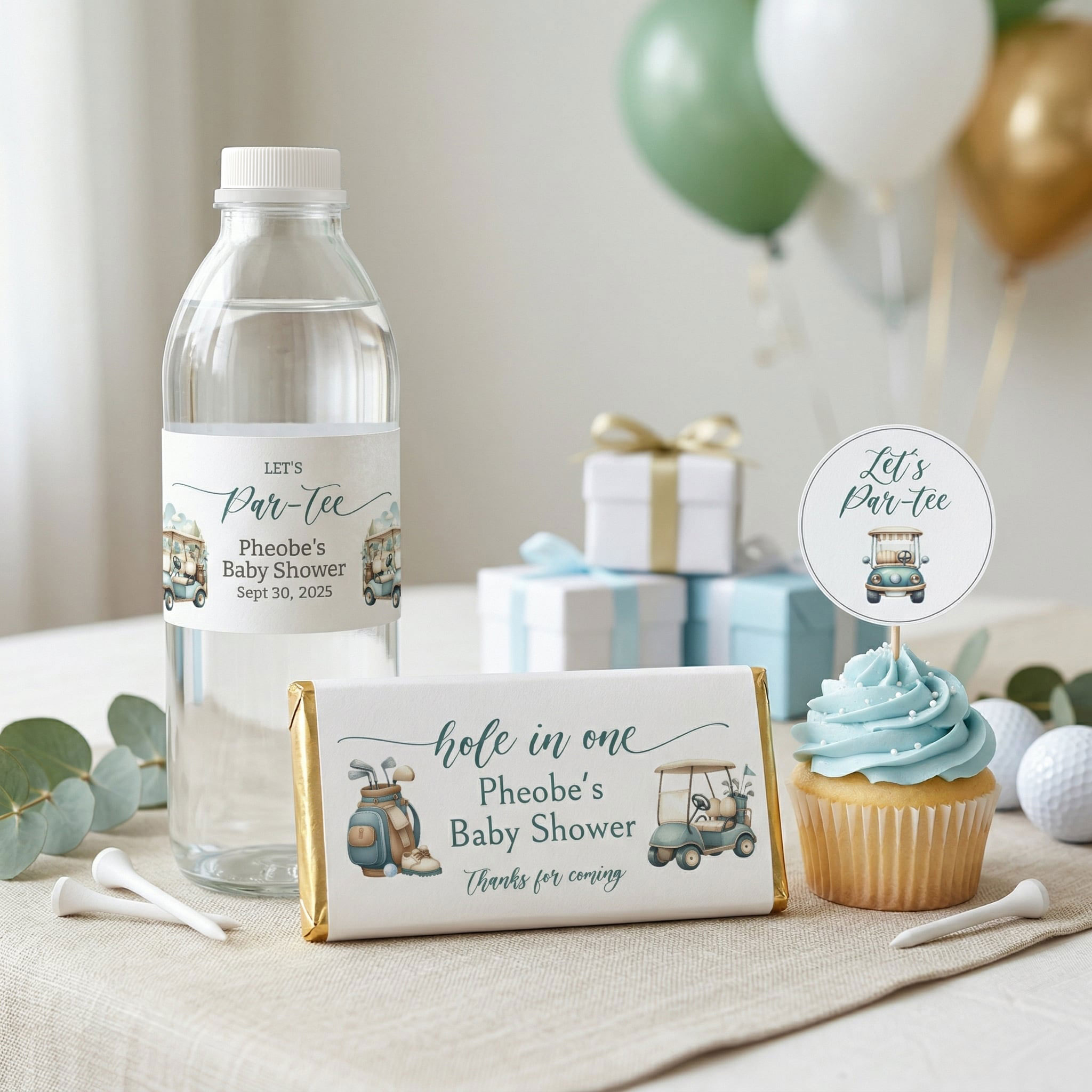 a selection of baby shower extras such as cupcake toppers, candy bar wrappers and water bottle labels
