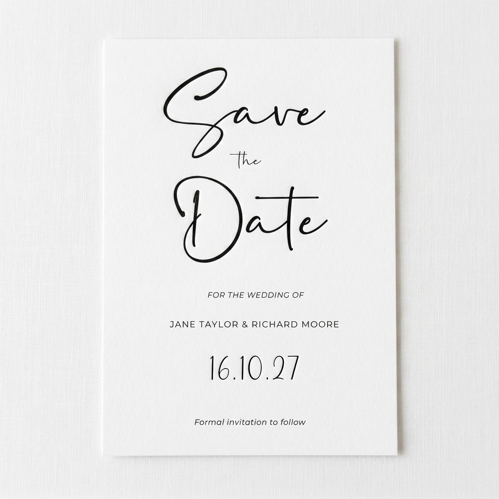 a minimalist style save the date card on smooth white card