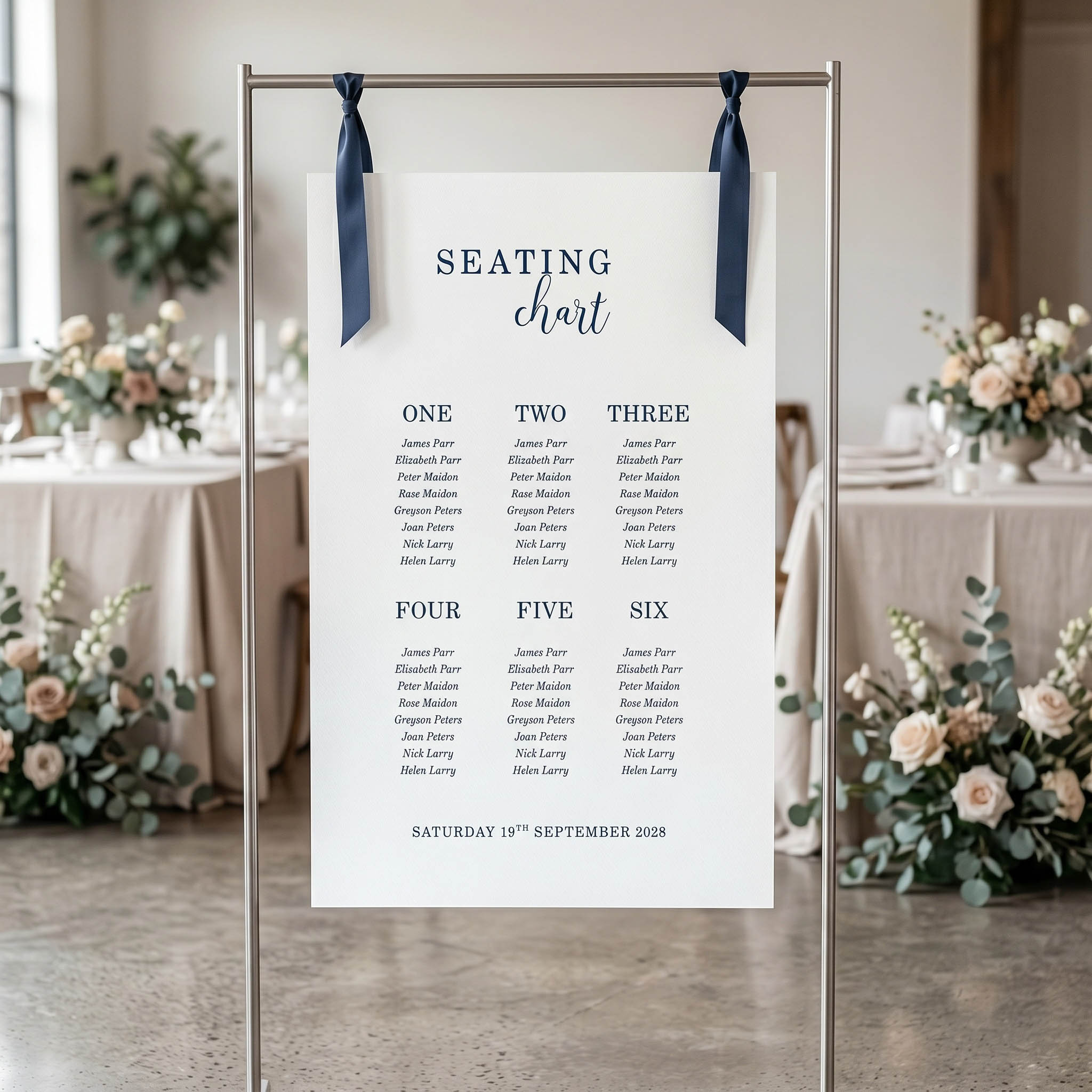a typography styled seating chart at a wedding